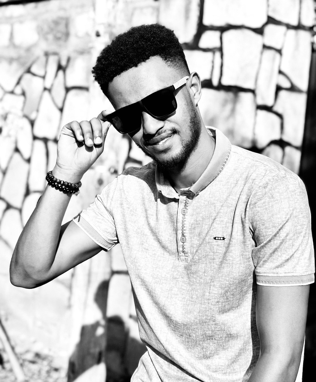 Kirubel Esayas smiling at the camera.